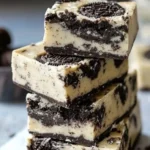 Delicious 3-Ingredient Oreo fudge ready to enjoy, featuring creamy chocolate and Oreo bits.