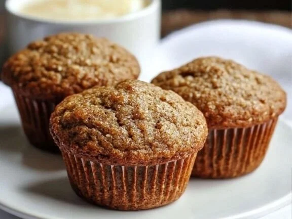 Bran muffins with applesauce, a healthy and moist snack option.