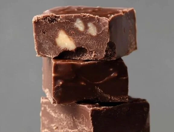 Delicious Toll House Famous Fudge showcasing rich chocolate texture and ingredients