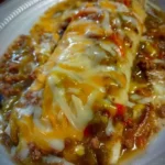 Delicious homemade Beef and Bean Burritos ready to serve.