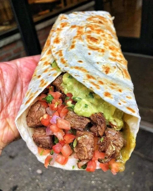Delicious beef quesadillas served with salsa and sour cream
