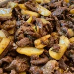 Delicious butter garlic steak bites served with roasted potatoes