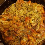 Delicious Cajun Shrimp Pasta served with herbs and spices