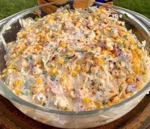 Delicious Cheesy Corn Bake with melted cheese and corn in a dish