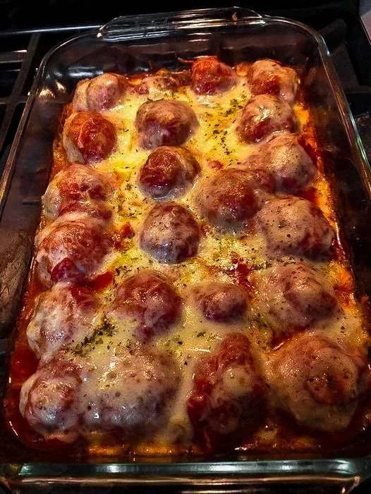 Cheesy Meatball Pasta Bake with melted cheese and flavorful meatballs