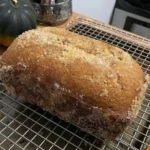 Freshly baked cinnamon bread with a golden crust and cinnamon swirl