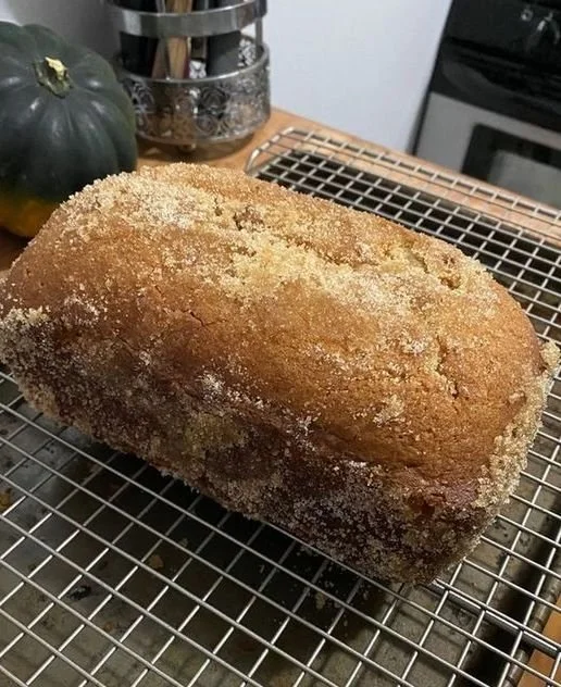 Freshly baked cinnamon bread with a golden crust and cinnamon swirl