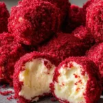 Delicious homemade Cornbread Poppers with dipping sauce on a serving platter.