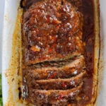 Delicious homemade meatloaf served with a rich glaze