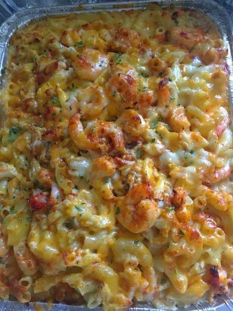 Delicious Seafood Macaroni and Cheese with shrimp and crab topping.