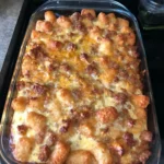 Delicious Tater Tot Breakfast Casserole served in a baking dish.