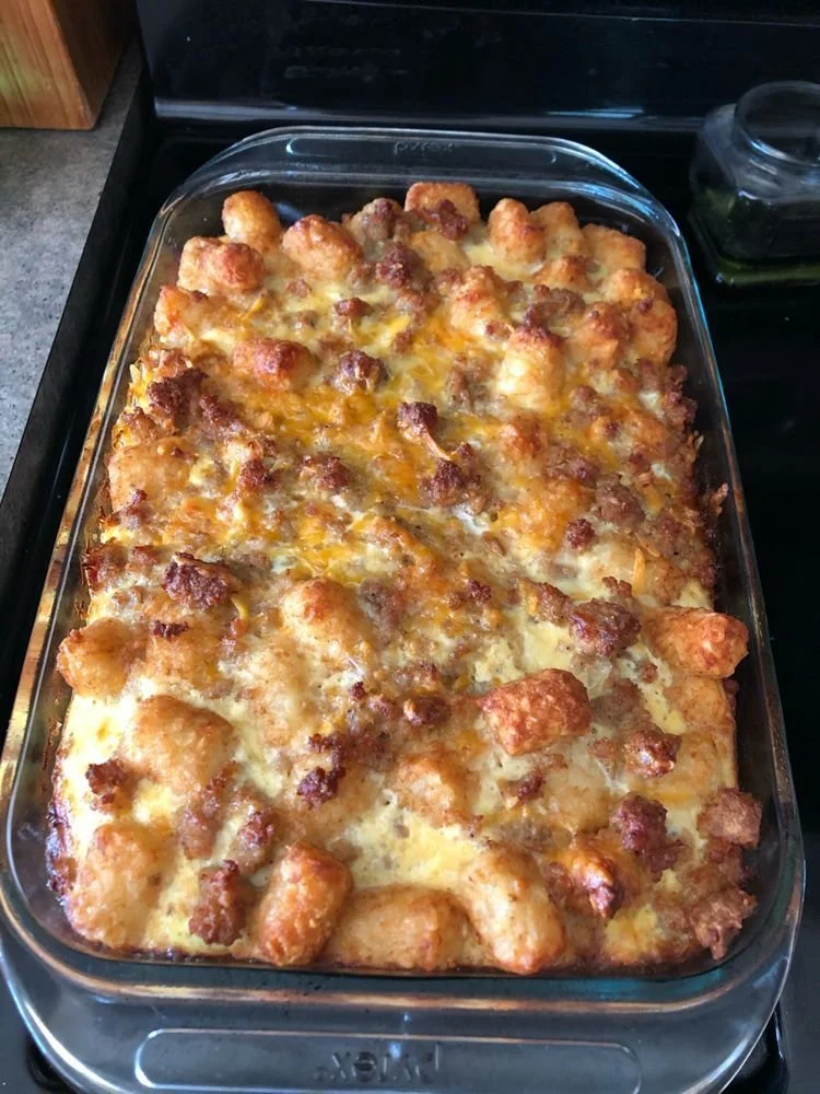 Delicious Tater Tot Breakfast Casserole served in a baking dish.