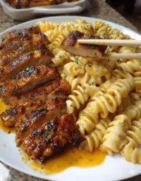 Creamy Chicken Rotini with Velveeta and Garlic Parmesan Alfredo sauce