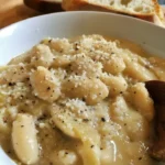 Delicious White Beans Cacio e Pepe Style dish with creamy sauce and cheese
