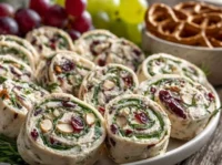 Chicken Cranberry Salad Pinwheel Sandwiches on a plate