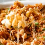 Creamy Mac and Cheese Casserole topped with breadcrumbs and cheese