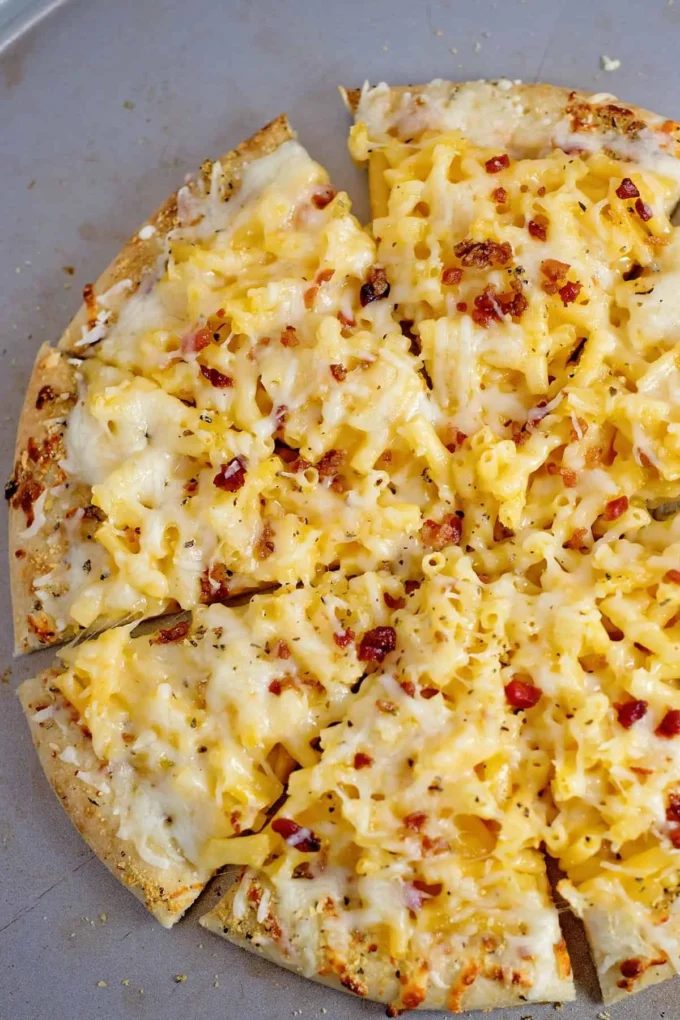 Delicious Mac and Cheese Pizza topped with creamy macaroni and gooey cheese