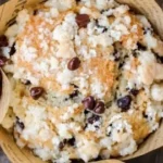 Chocolate Chip Crumble Muffins with a crispy topping, freshly baked.