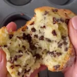 Delicious fluffy chocolate chip muffins fresh out of the oven