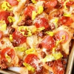 Plate of Old Chicago's Italian Nachos topped with herbs and cheese