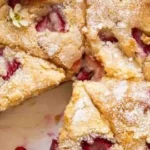 Delicious French Strawberry Cake with fresh strawberries and whipped cream.