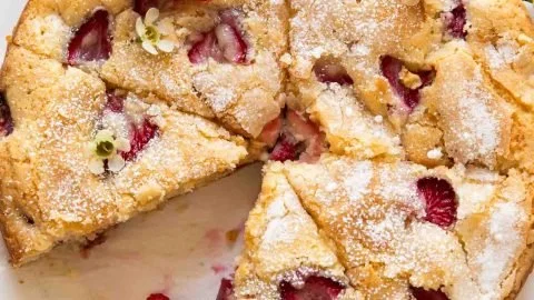 Delicious French Strawberry Cake with fresh strawberries and whipped cream.