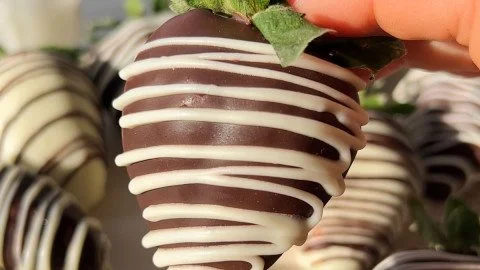 Vegan chocolate covered strawberries on a plate