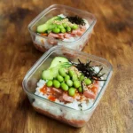 Protein-packed sushi bowl with fresh vegetables and seafood ingredients