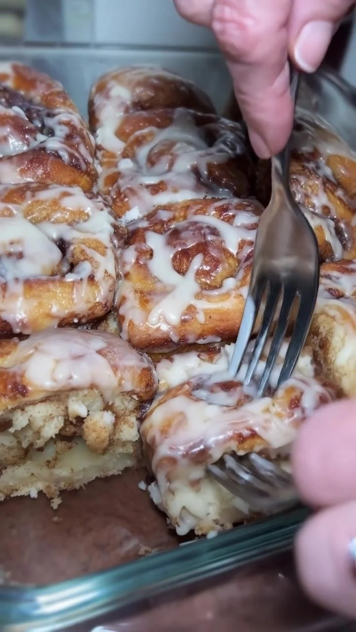 Big-batch cinnamon rolls recipe by Bonnie, featuring fluffy dough and sweet icing.