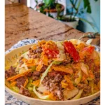 Deliciously layered Crunchy Doritos Taco Salad with vibrant ingredients