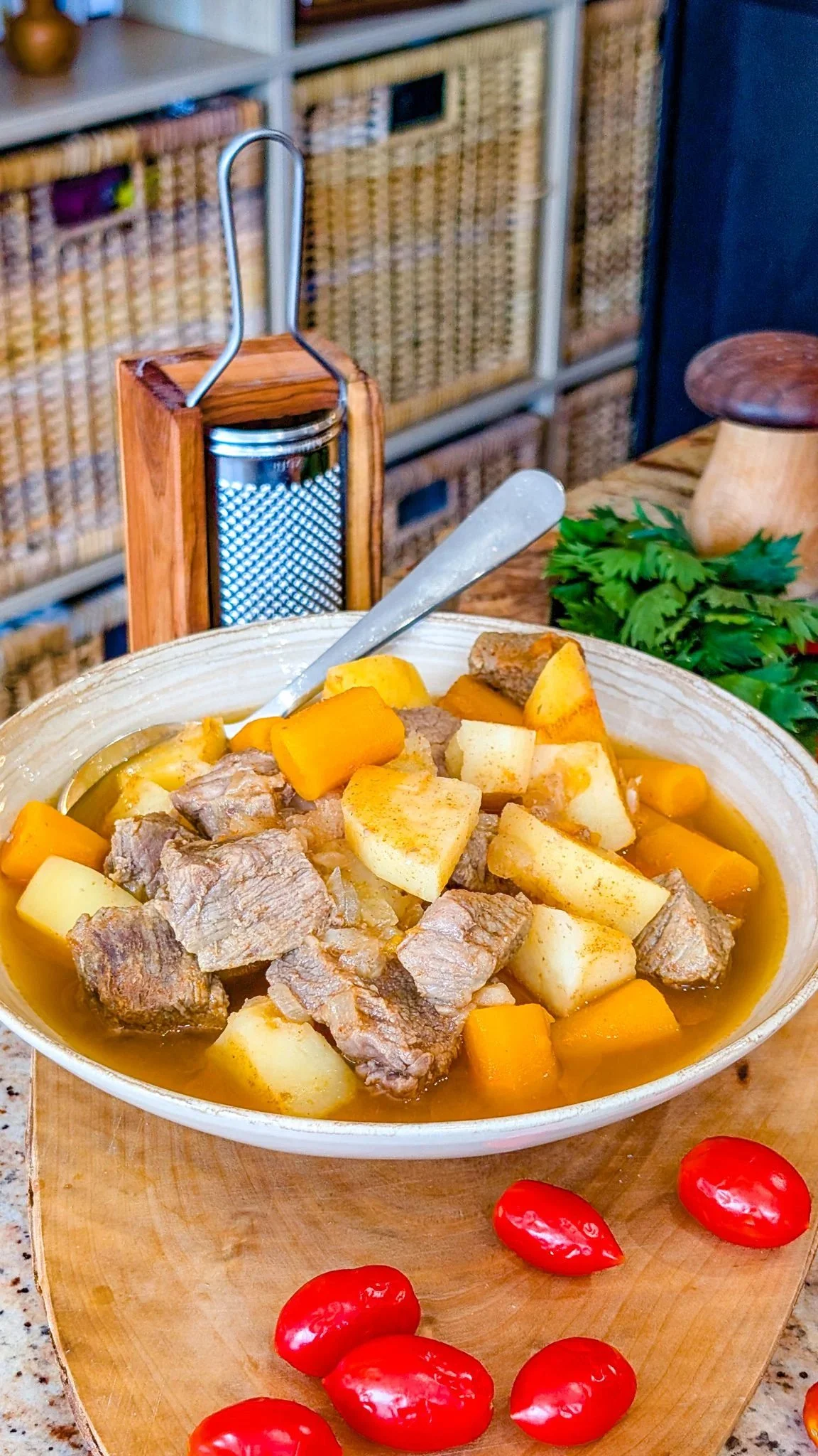 Bowl of five-ingredient slow cooker soup topped with herbs
