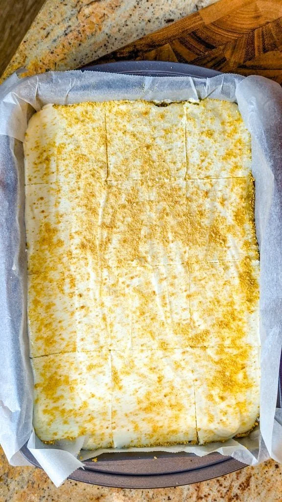 Delicious slice of Genuine Woolworth Cheesecake topped with whipped cream.