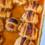 Grandma's delicious apple dumplings served with cinnamon and vanilla sauce