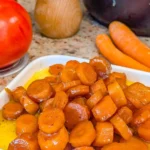 Bowl of Slow-Cooker Amish Glazed Carrots, a delicious side dish
