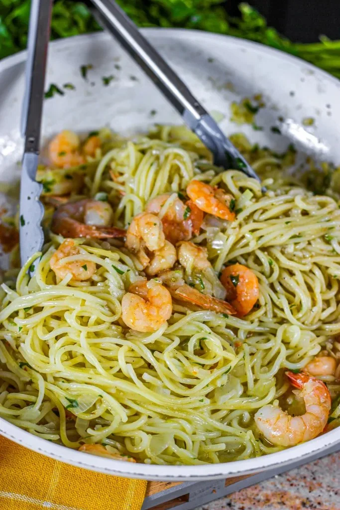 Spaghetti with Garlic Butter Shrimp served in a bowl, garnished with parsley.