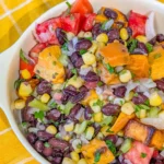 Sweet Potato Pico de Gallo Salsa in a colorful bowl with fresh ingredients.