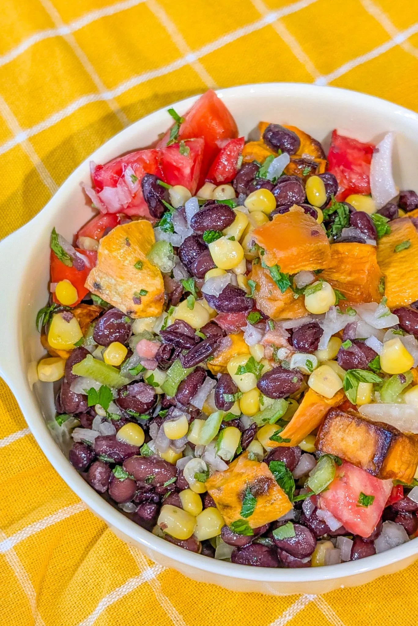 Sweet Potato Pico de Gallo Salsa in a colorful bowl with fresh ingredients.