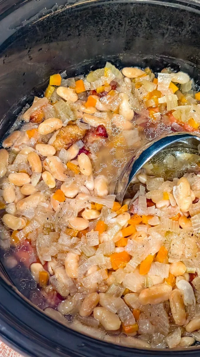 Delicious beans with ham hocks served in a bowl, showcasing a hearty meal.