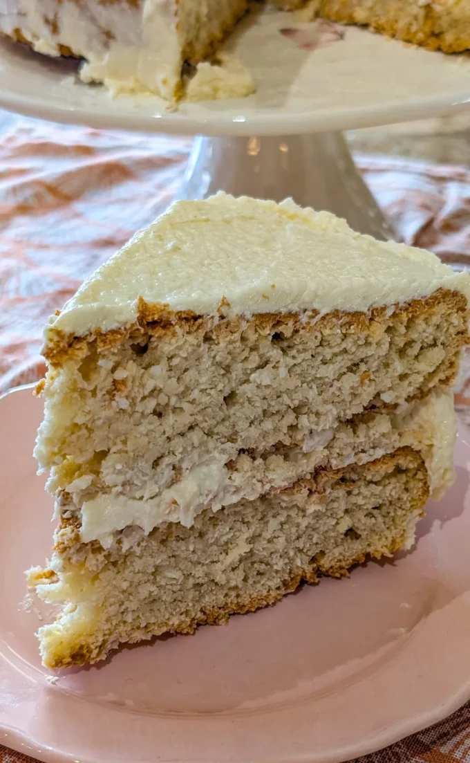 Delicious Coconut Layer Cake with fluffy layers and coconut frosting