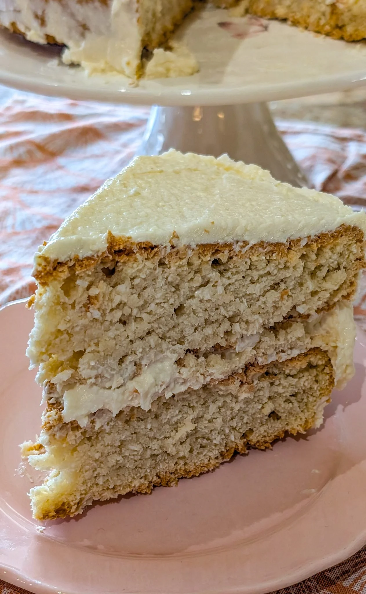Delicious Coconut Layer Cake with fluffy layers and coconut frosting
