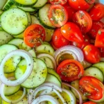 Cucumber, onion, and tomato marinade for enhancing dishes
