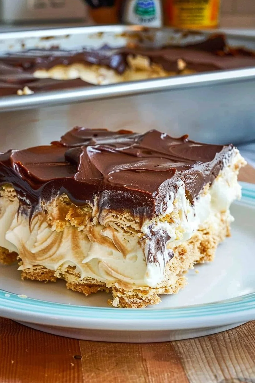 Decadent chocolate eclair cake with creamy layers and rich chocolate frosting.