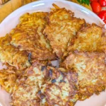 Homemade German potato pancakes served with applesauce and sour cream