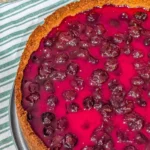 Indulgent fresh blueberry cheesecake topped with ripe blueberries