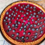 Delicious fresh blueberry cheesecake topped with juicy blueberries