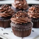 Decadent ultra-moist chocolate cupcakes topped with chocolate frosting