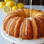 Deliciously moist zesty lemon bundt cake with a golden crust and lemon glaze