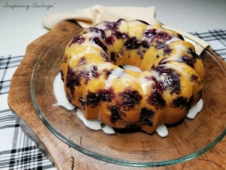 Freshly baked Blueberry Sour Cream Pound Cake with blueberries on top