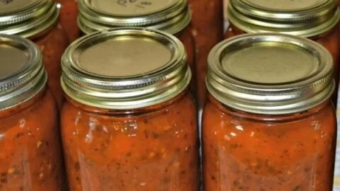 Homemade thick pizza sauce recipe with bold and zesty flavors.