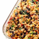 Cheesy Chicken Burrito Bake with melted cheese and colorful toppings